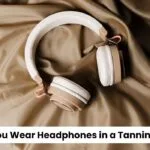 Can You Wear Headphones in a Tanning Bed